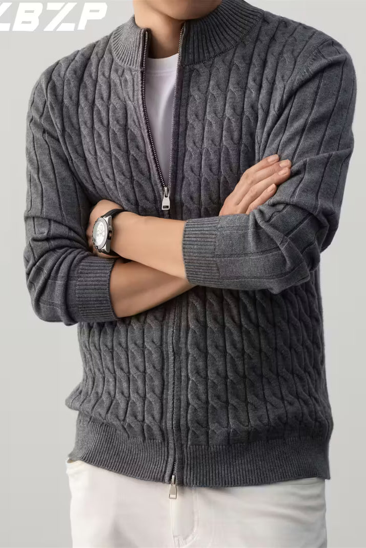 Person wearing a gray cable knit sweater with a zipper on a light gray background, featuring the brand 'Z.B.Z.P'.