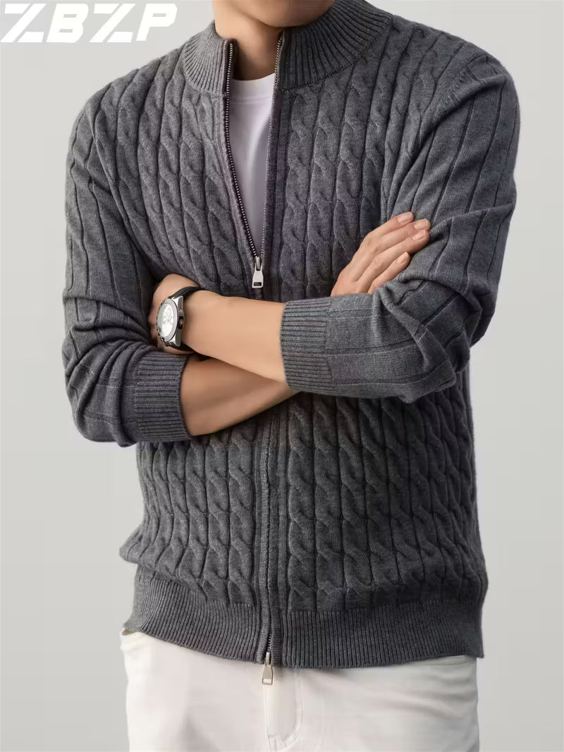 Person wearing a gray cable knit sweater with a zipper on a light gray background, featuring the brand 'Z.B.Z.P'.