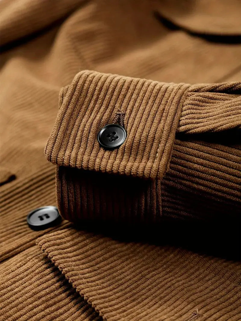 Close-up of a brown corduroy jacket with buttons