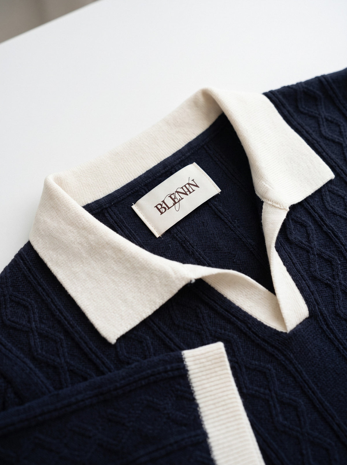 Men's diamond knit polo in navy and white, BLENIN label