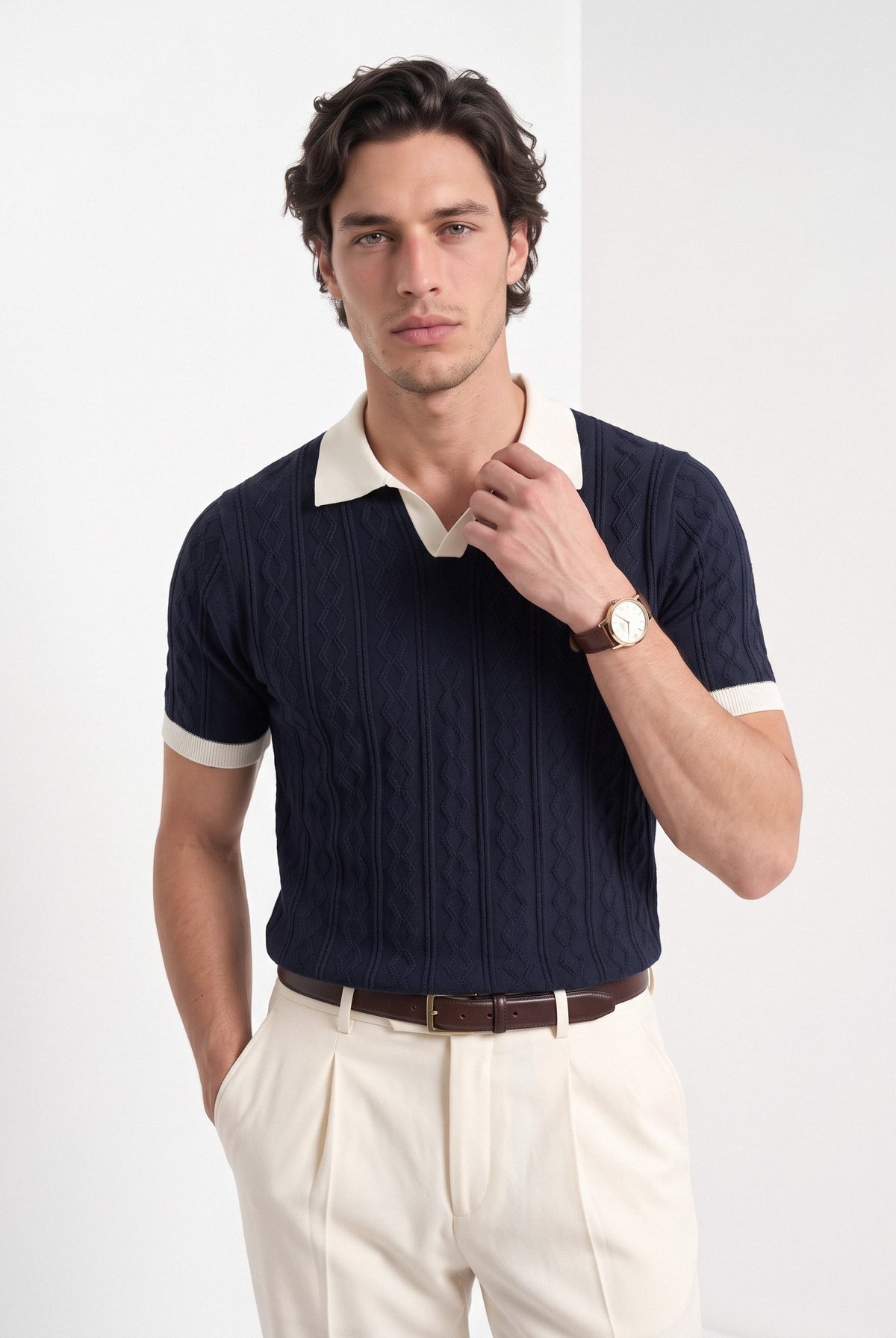 Men's diamond knit polo in navy and white, front portrait