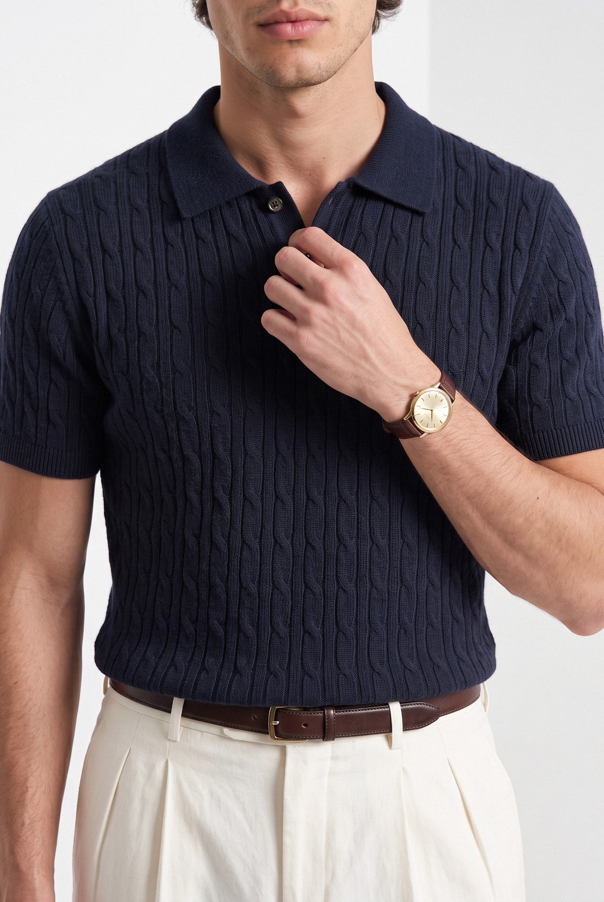 Men's cashmere knitted polo shirt in navy, close-up detail
