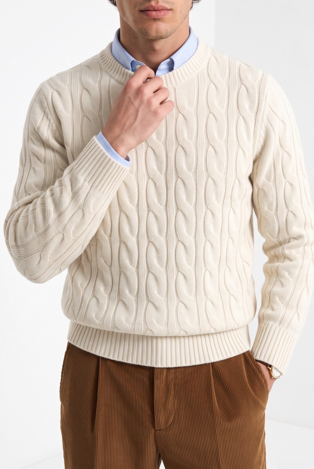 Men's wool cashmere cable knit sweater in cream, close-up detail