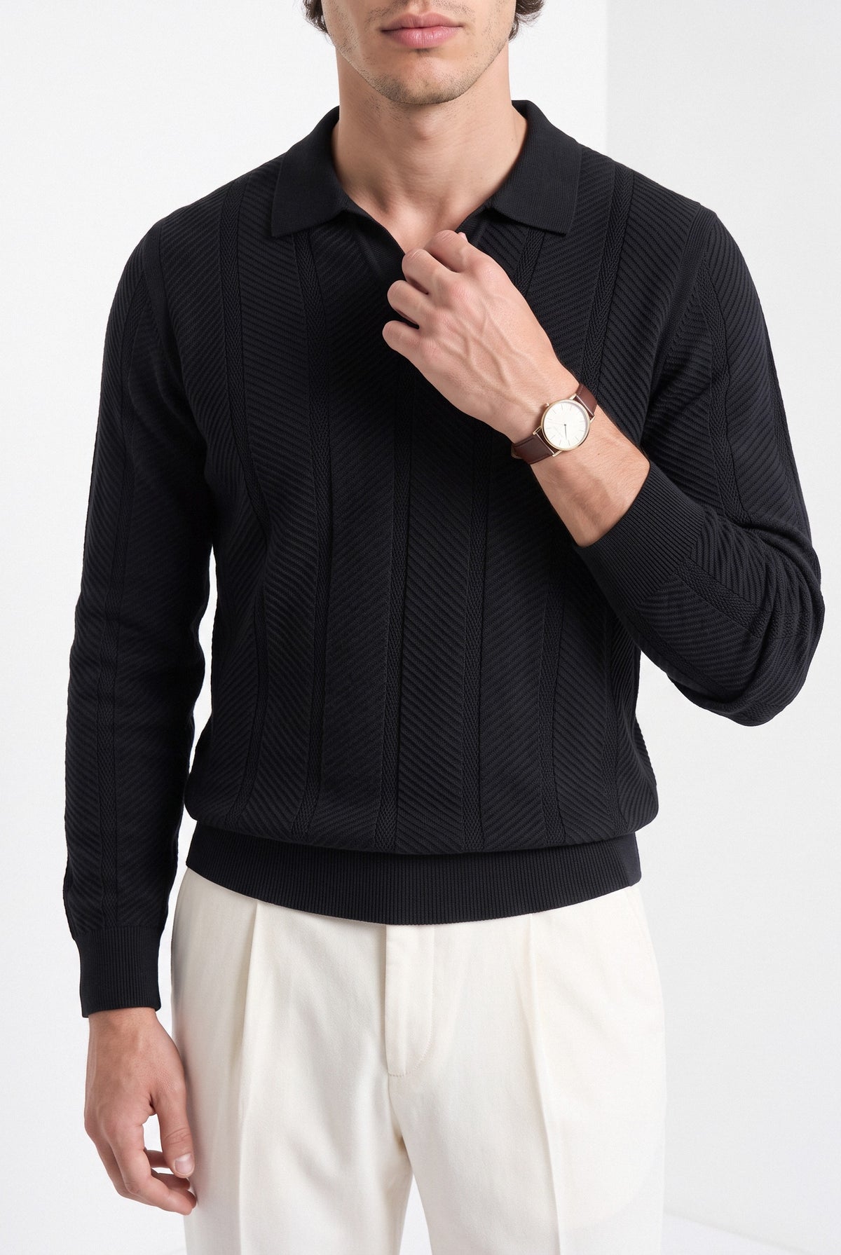 Men's long sleeve textured knitted polo in black, close-up detail