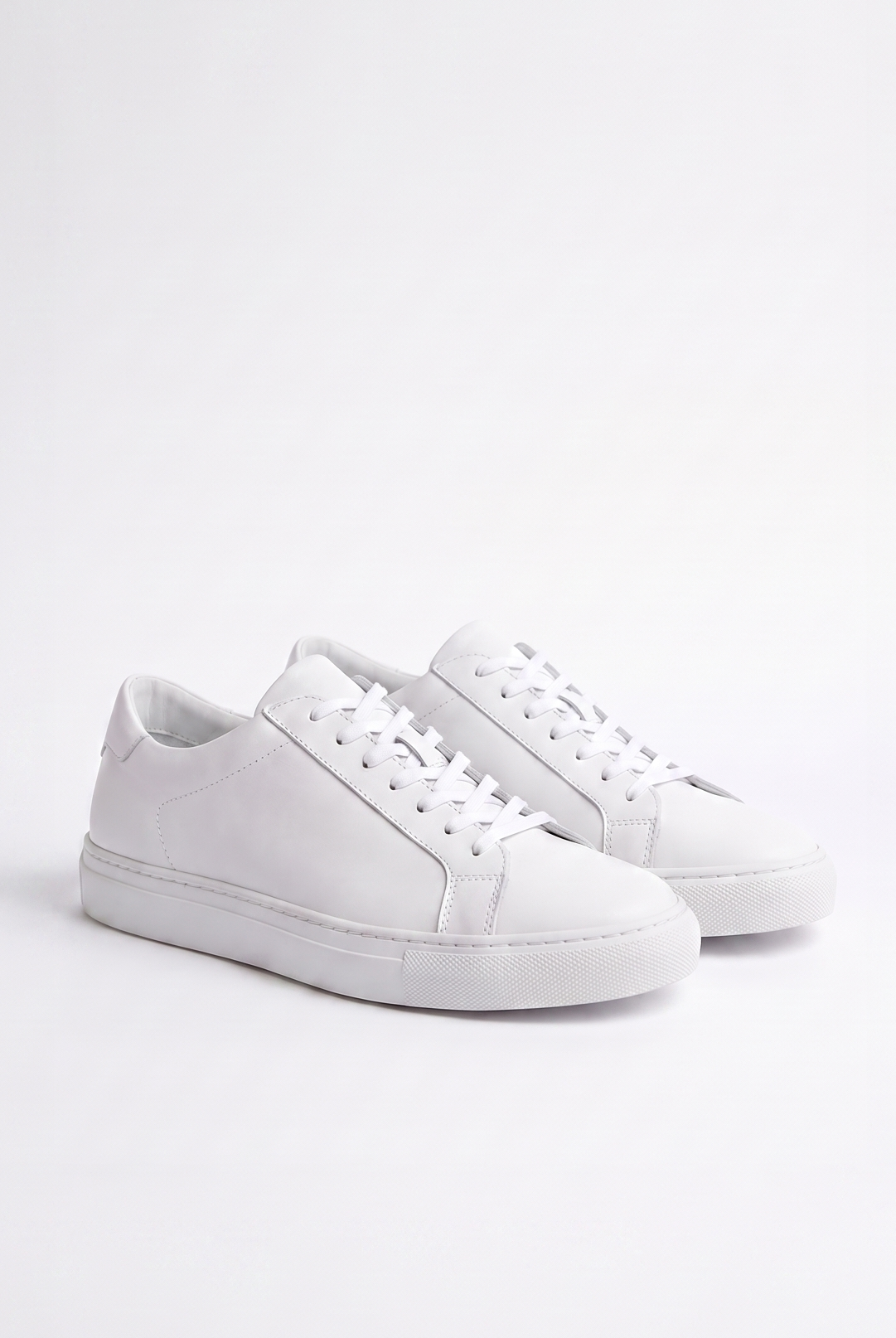 White sneakers on a light gray background