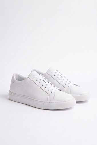 White sneakers on a light gray background