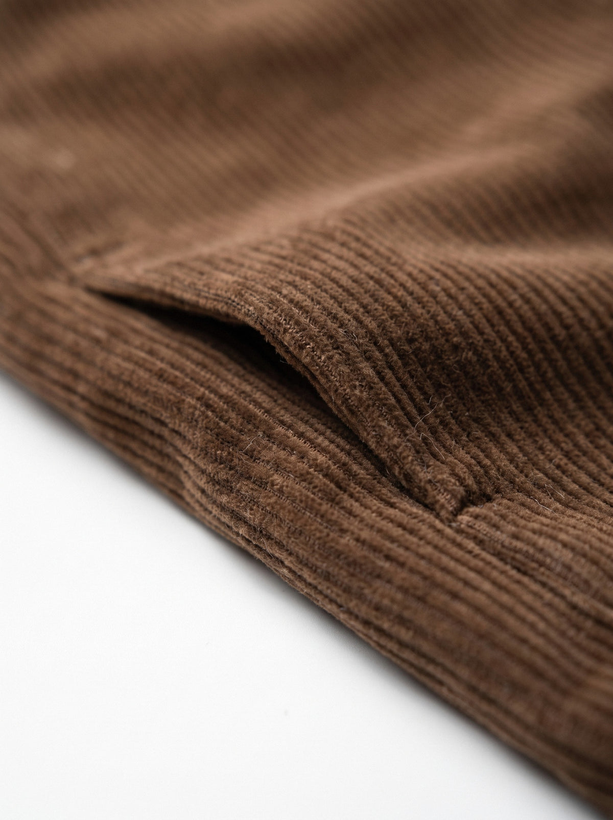 BLENIN men's corduroy pleated trousers in brown, fabric close-up