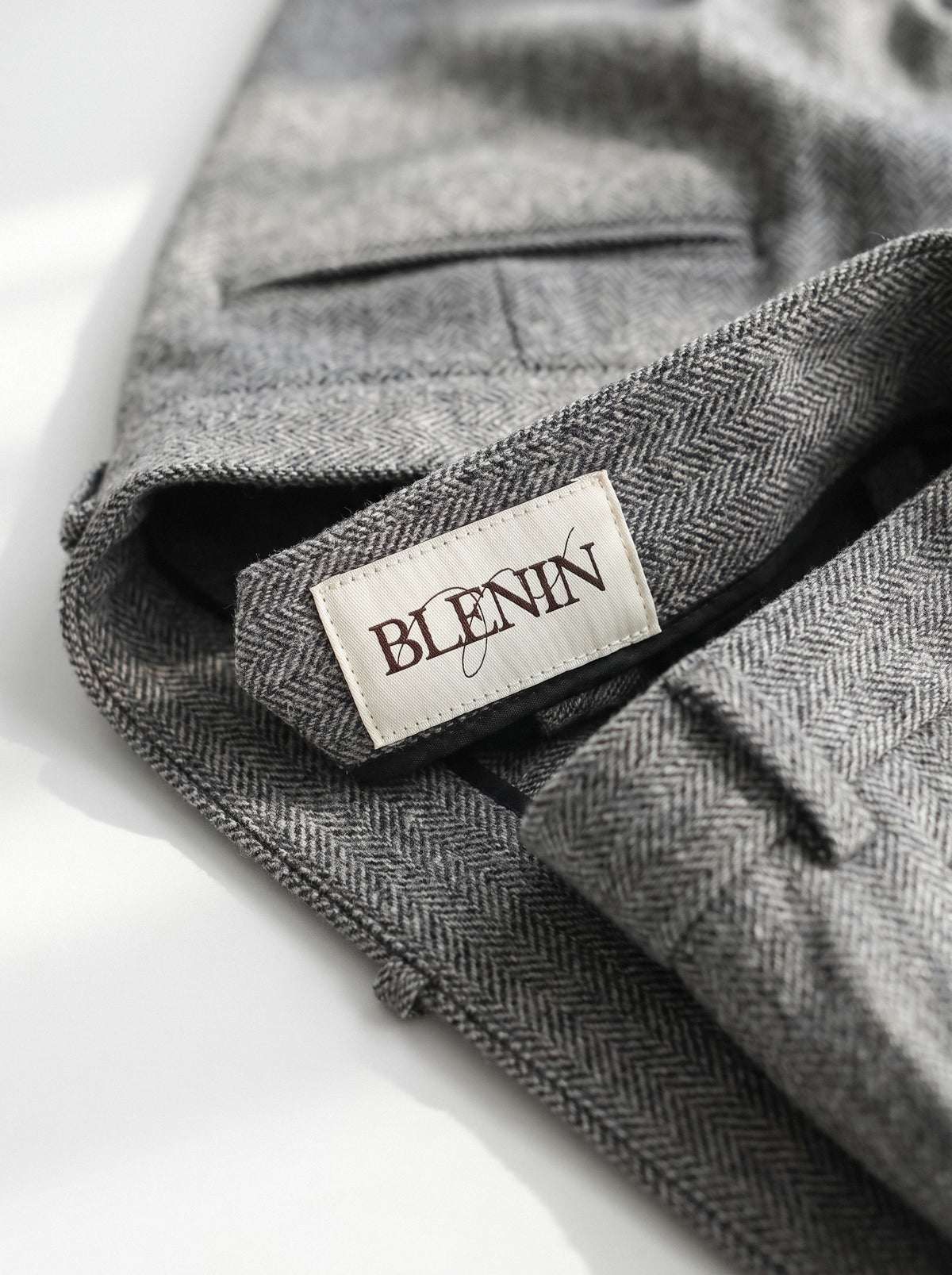 BLENIN herringbone wool trousers, woven BLENIN label