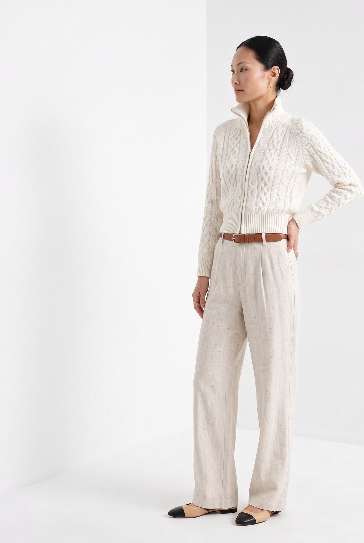 BLENIN cable knit zip cardigan in ivory, three-quarter view