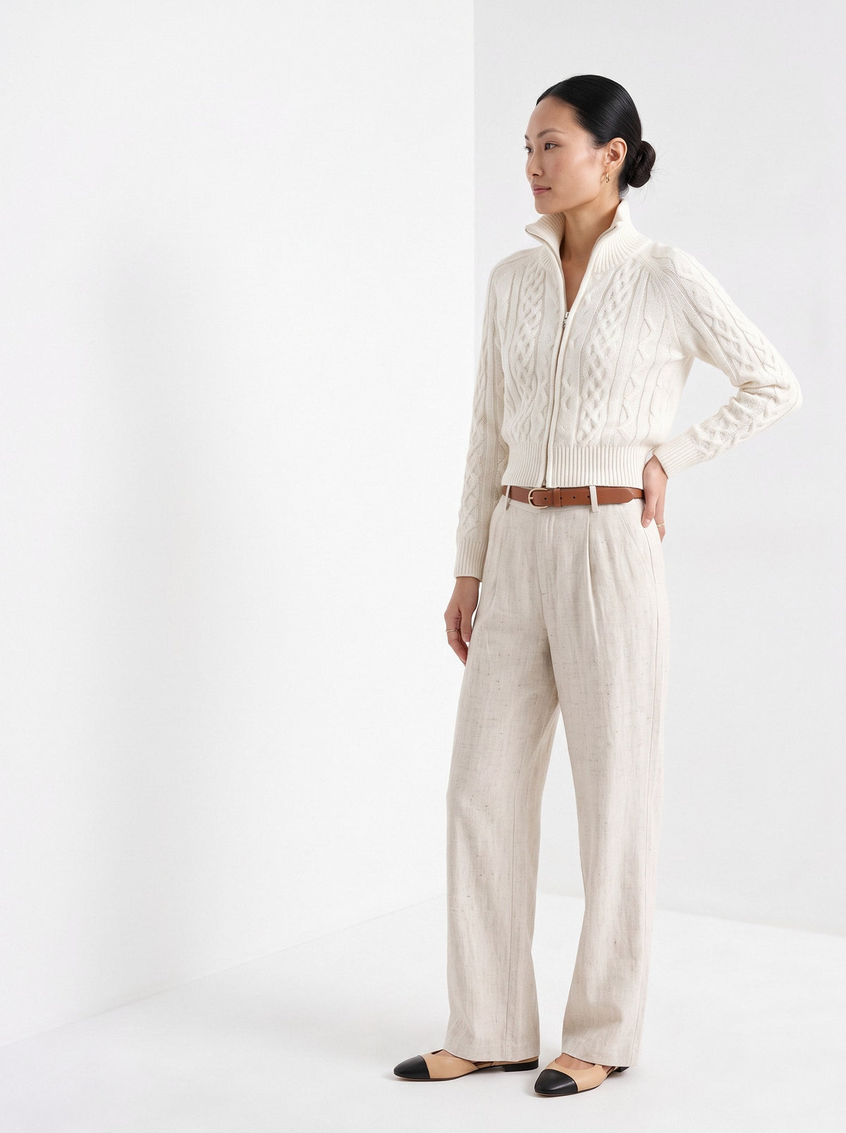 BLENIN cable knit zip cardigan in ivory, three-quarter view