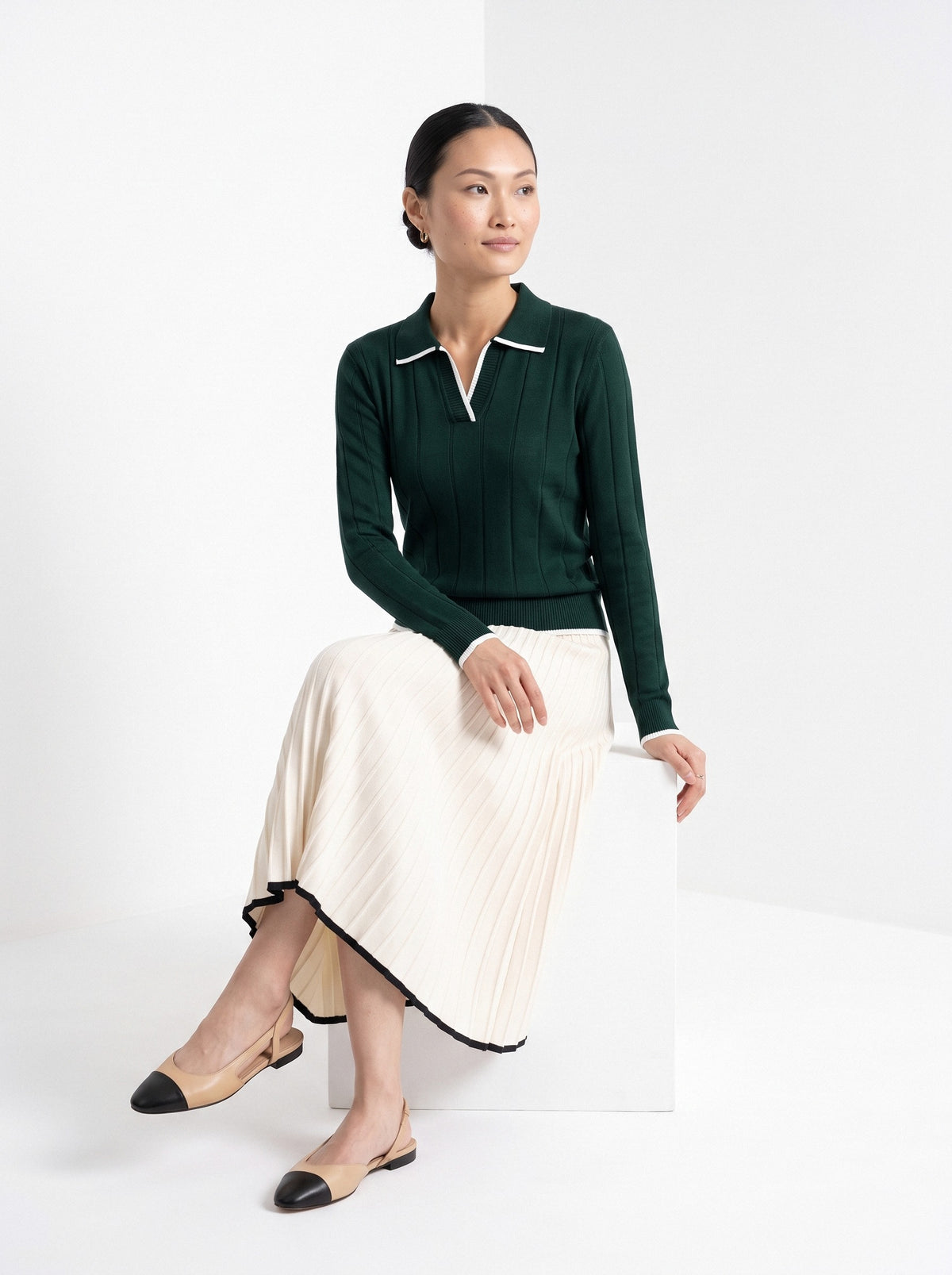 BLENIN contrast trim knit polo in forest green, seated, full outfit