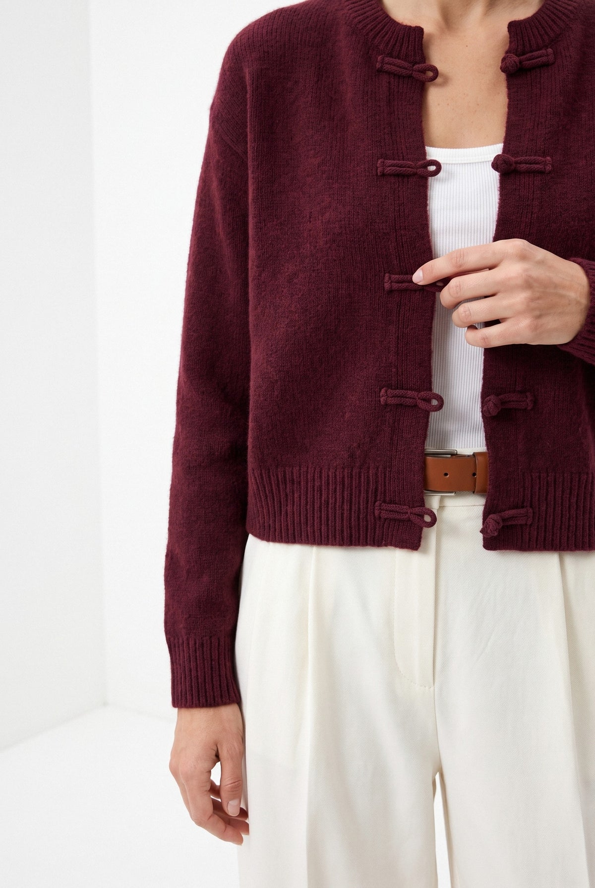 BLENIN knot button cardigan in burgundy, close-up of the details