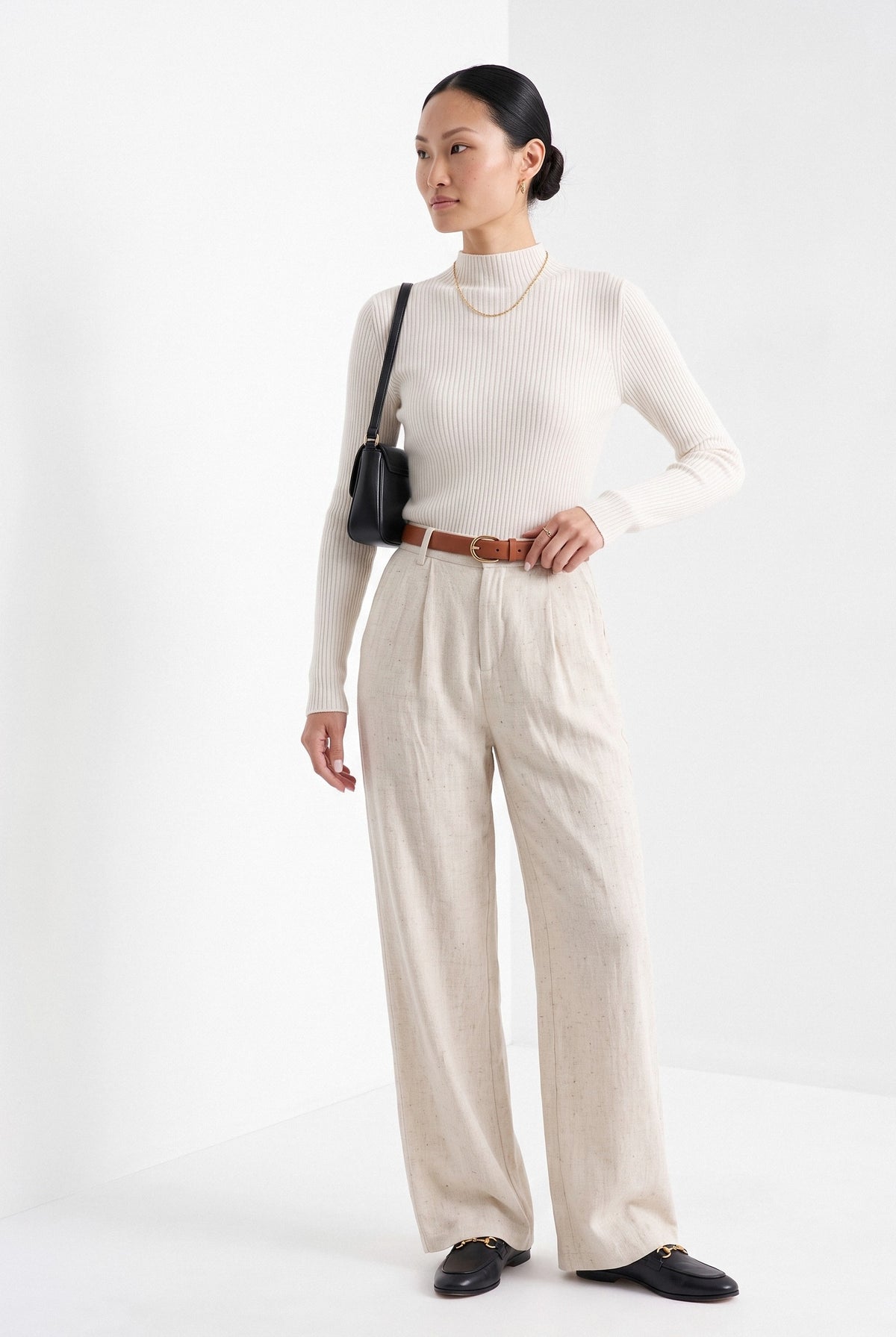 BLENIN cashmere mock neck sweater in milky, three-quarter view