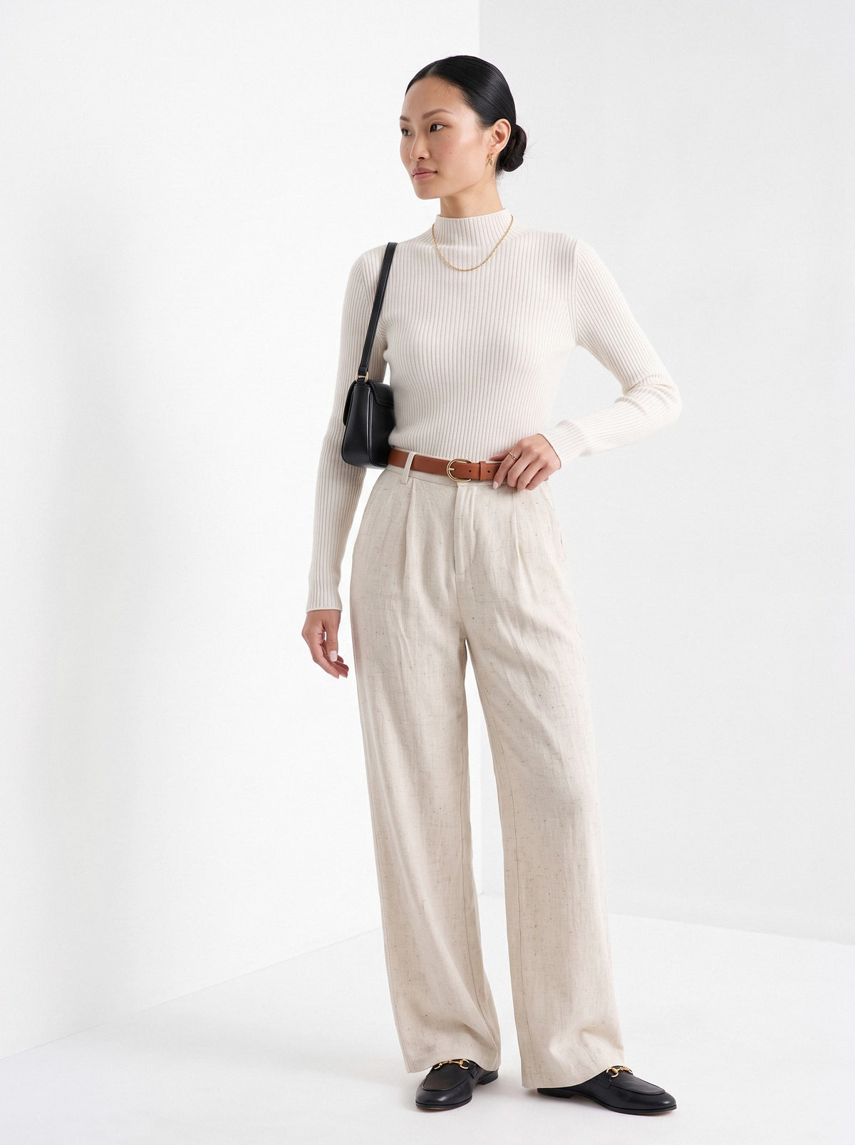 BLENIN cashmere mock neck sweater in milky, three-quarter view
