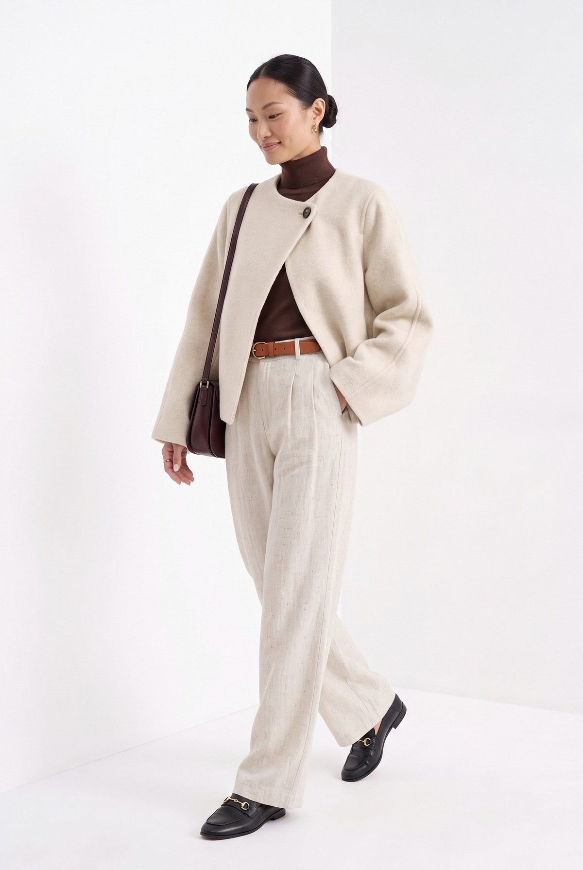 BLENIN collarless short coat in cream, full outfit, walking