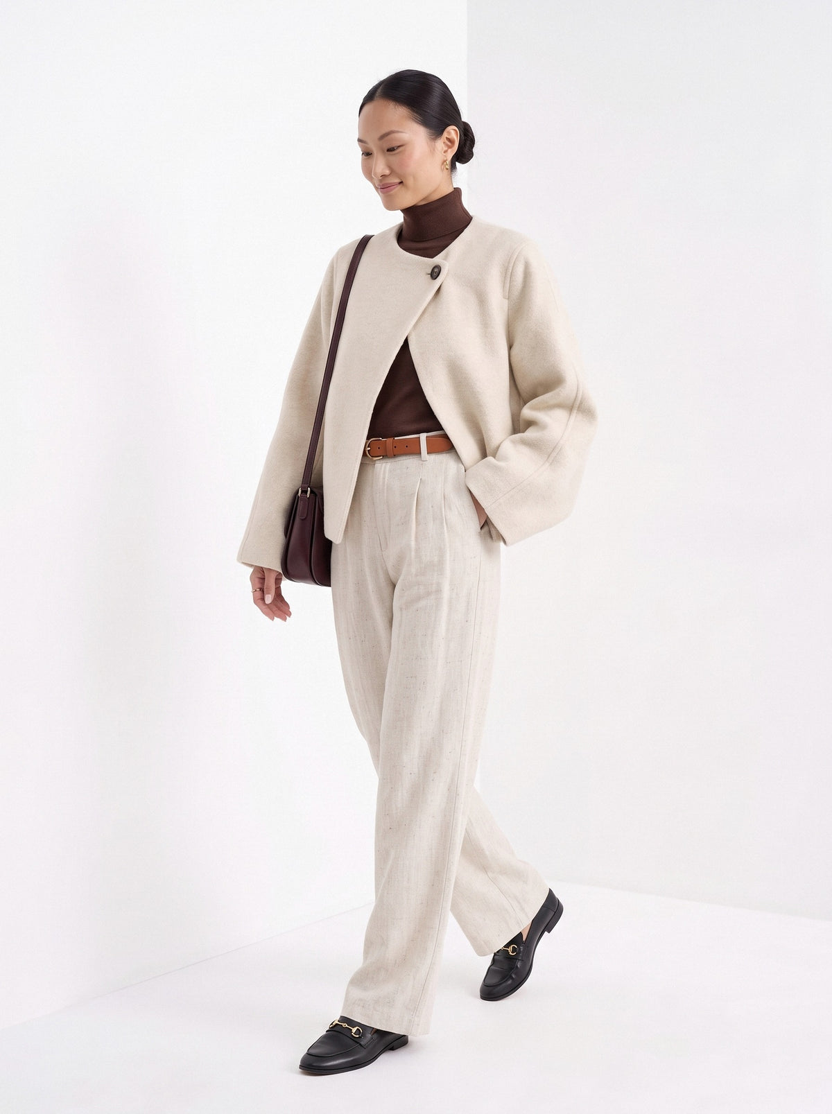 BLENIN collarless short coat in cream, full outfit, walking