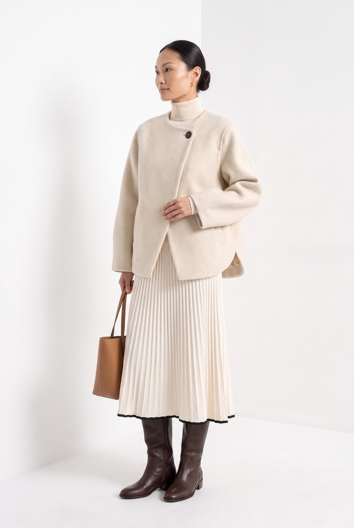 BLENIN collarless short coat in cream, three-quarter view
