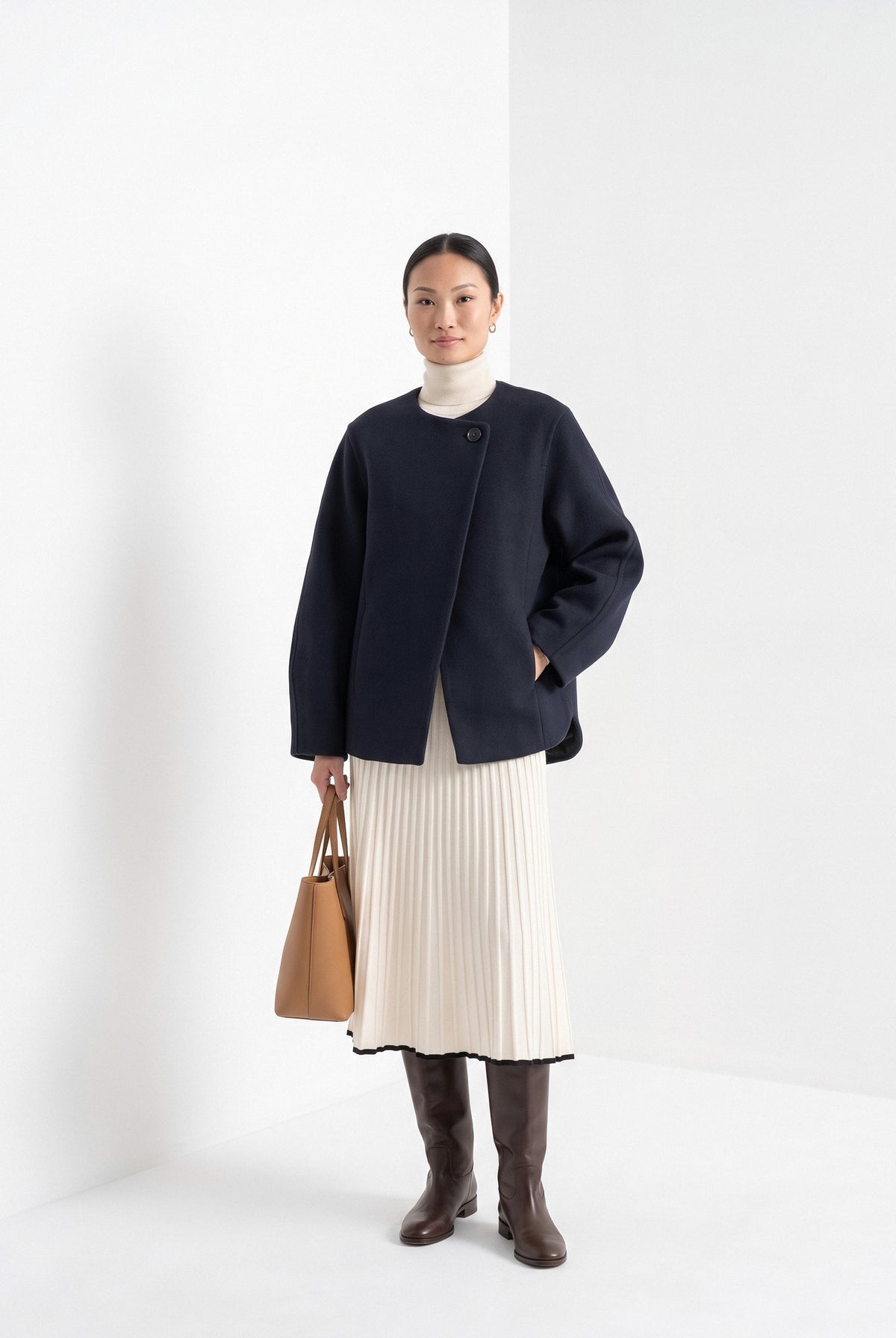 BLENIN collarless short coat in navy, full-length front view