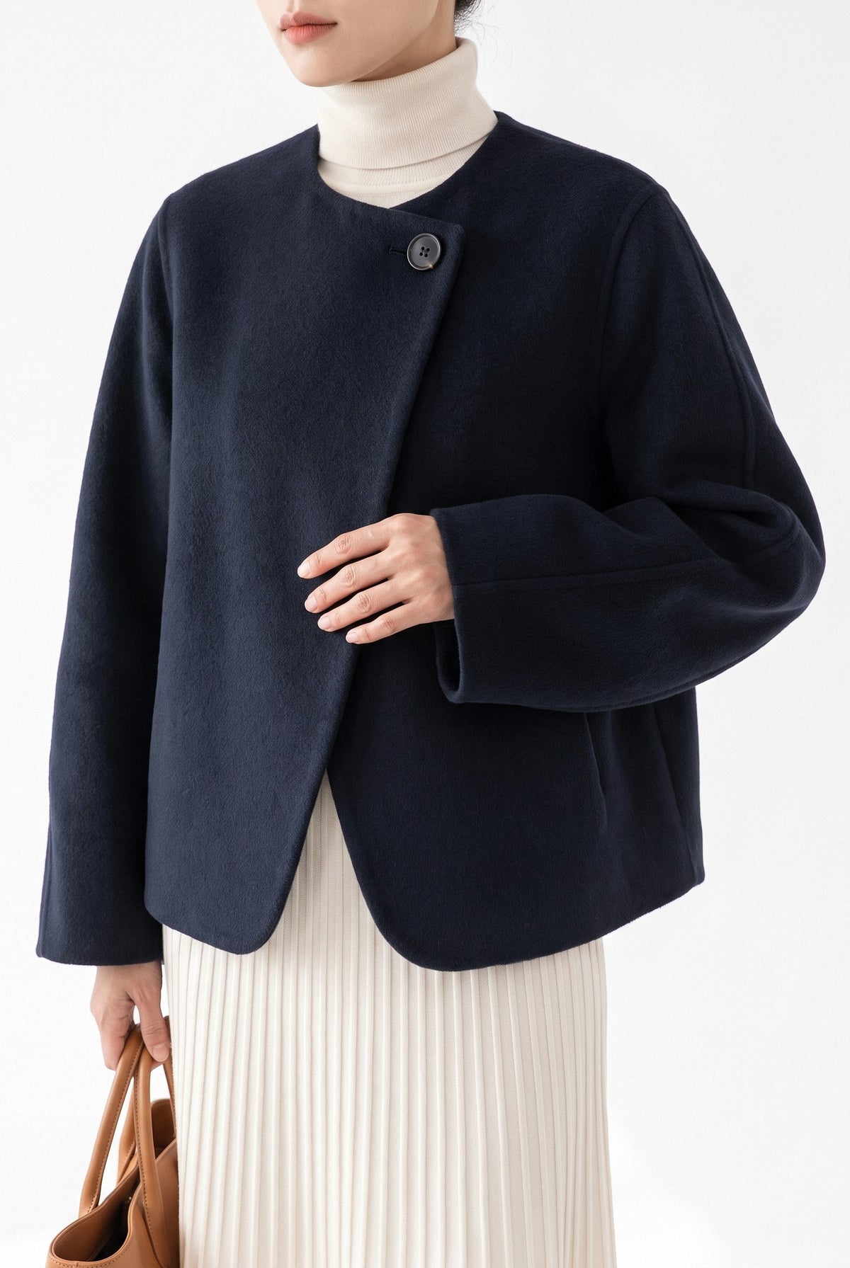 BLENIN collarless short coat in navy, close-up of the details