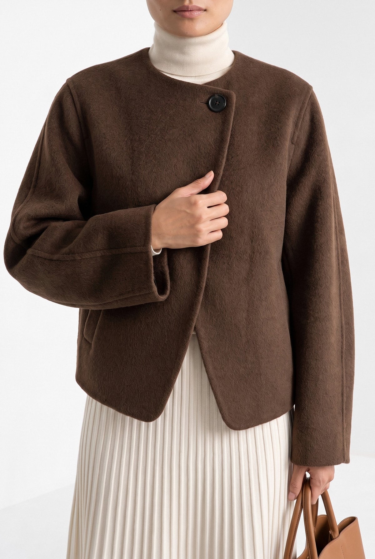 BLENIN collarless short coat in chocolate, close-up of the details