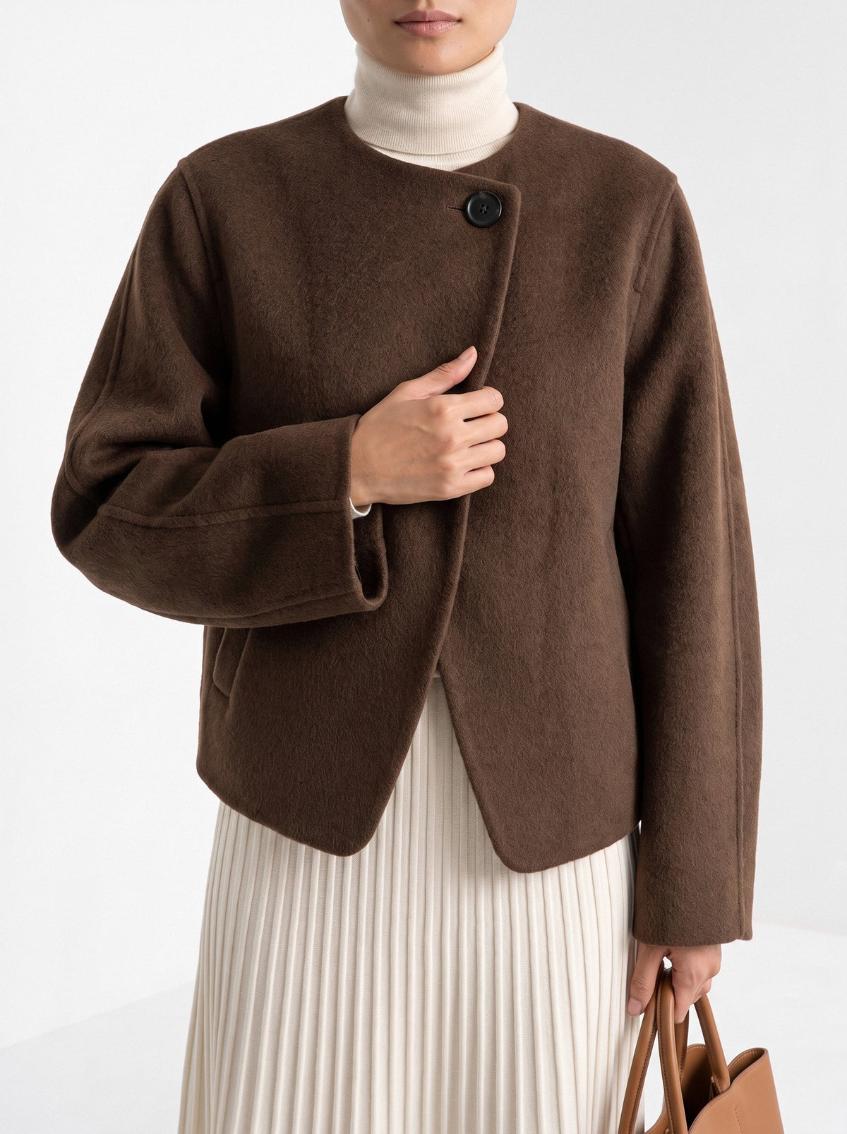 BLENIN collarless short coat in chocolate, close-up of the details