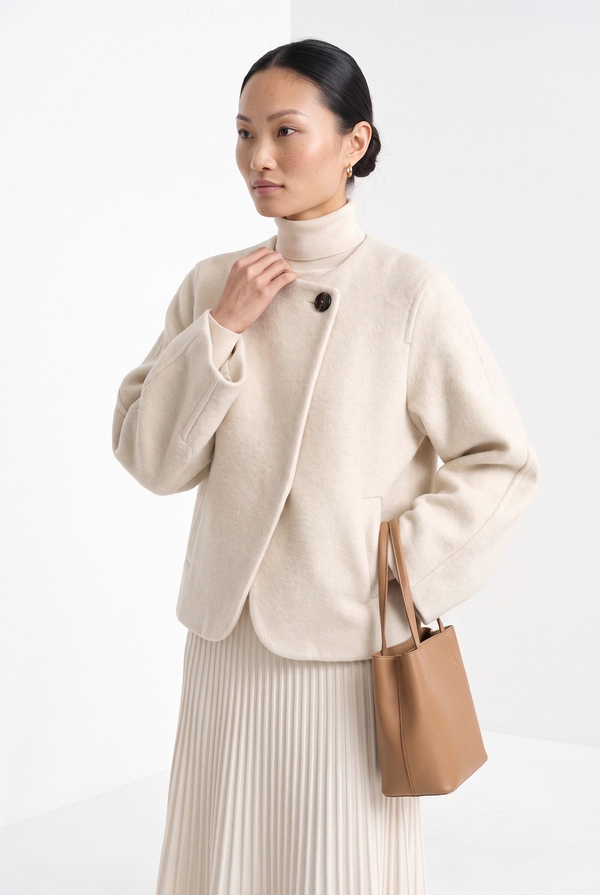 BLENIN collarless short coat in cream, front portrait