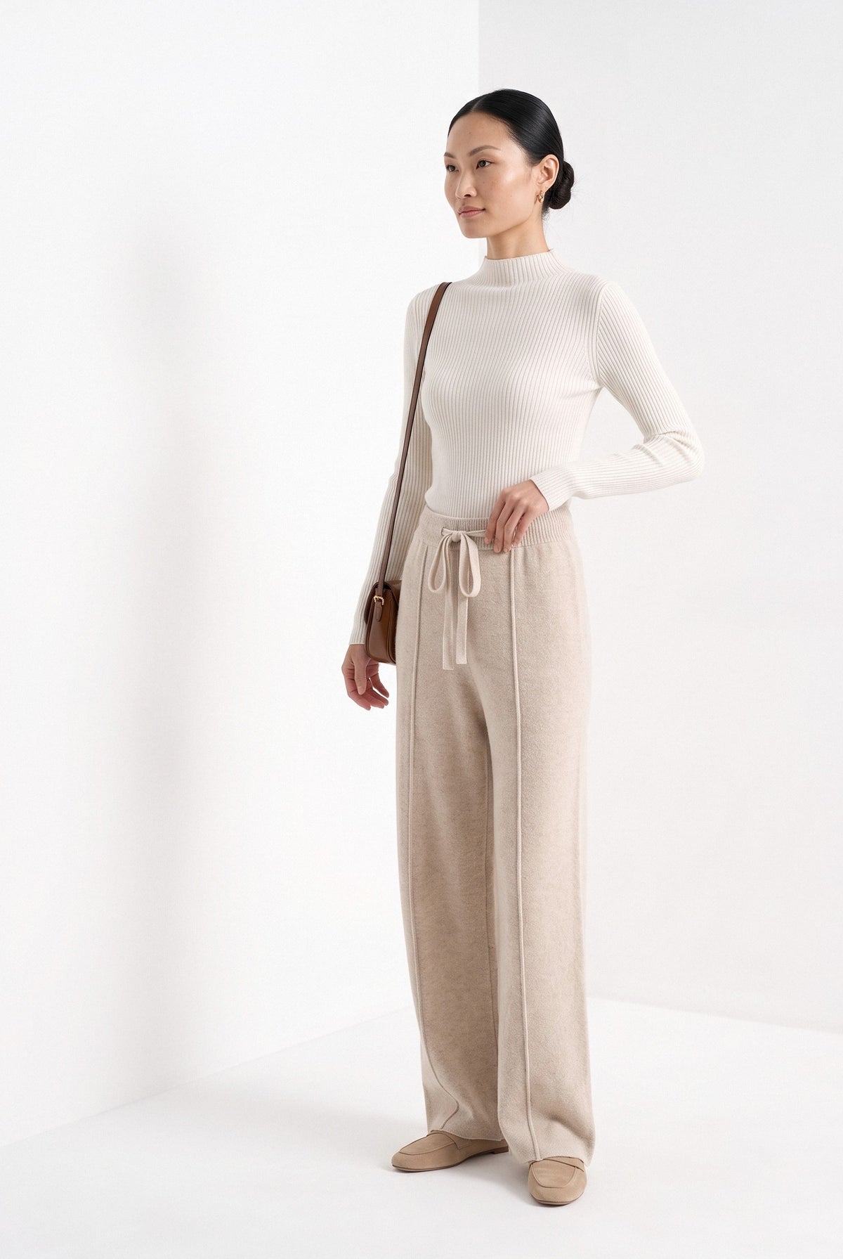 BLENIN knit wide leg trousers in beige, three-quarter view