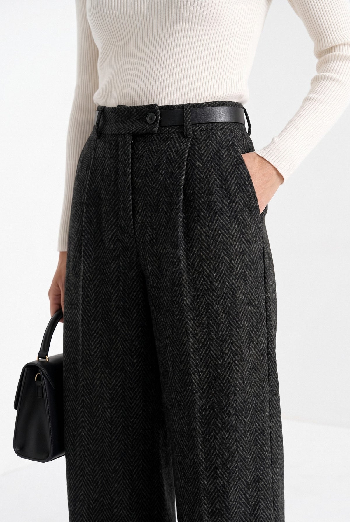 BLENIN herringbone wide leg trousers in black, close-up of the details