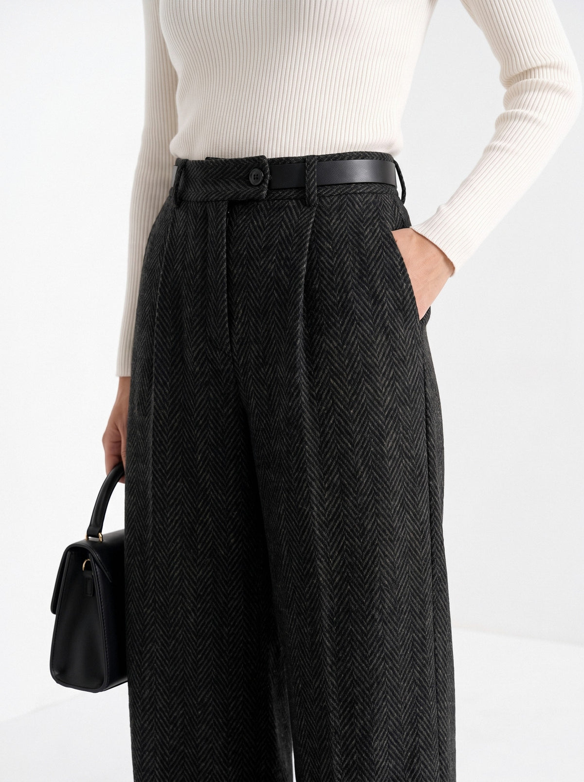 BLENIN herringbone wide leg trousers in black, close-up of the details