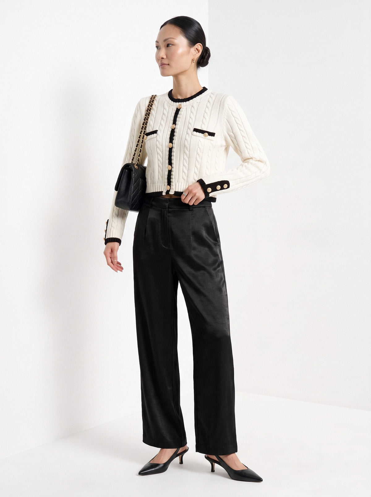 BLENIN satin wide leg trousers in black, three-quarter view