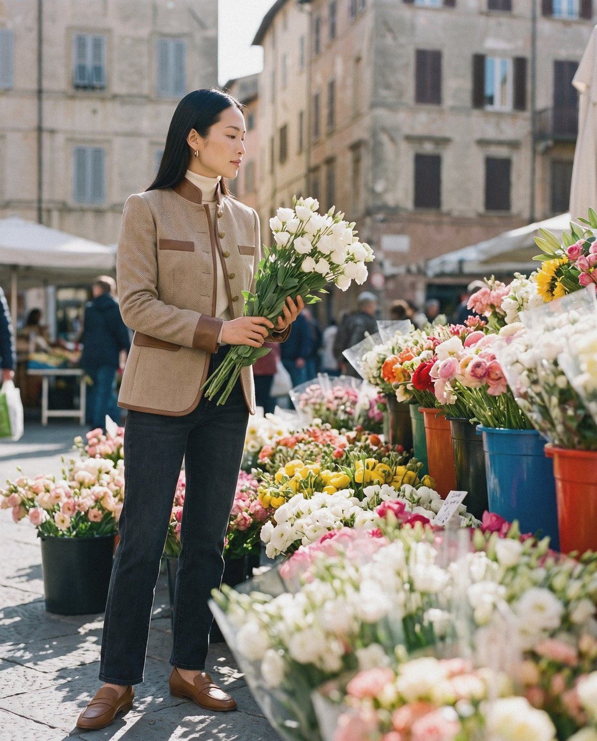 Woman in a herringbone jacket, cream turtleneck and straight jeans – BLENIN quiet luxury womenswear