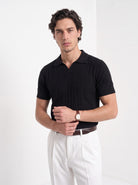 Men's diamond knit polo in black, front portrait