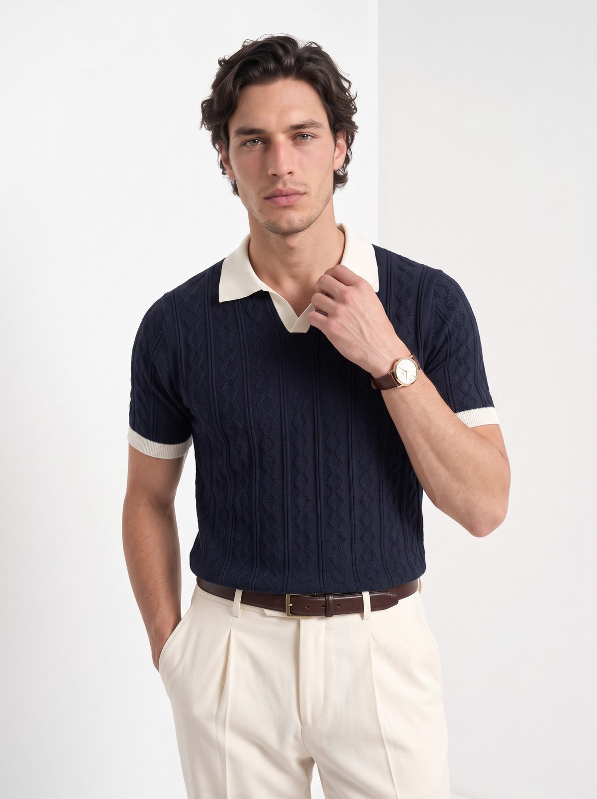 Men's diamond knit polo in navy and white, front portrait