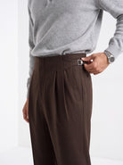 Men's pleated Gurkha trousers in brown, close-up detail