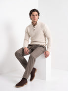 BLENIN men's basket weave button sweater in cream, seated, full outfit