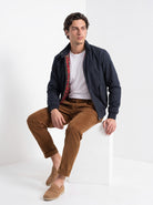 BLENIN men's harrington jacket in navy, seated, full outfit