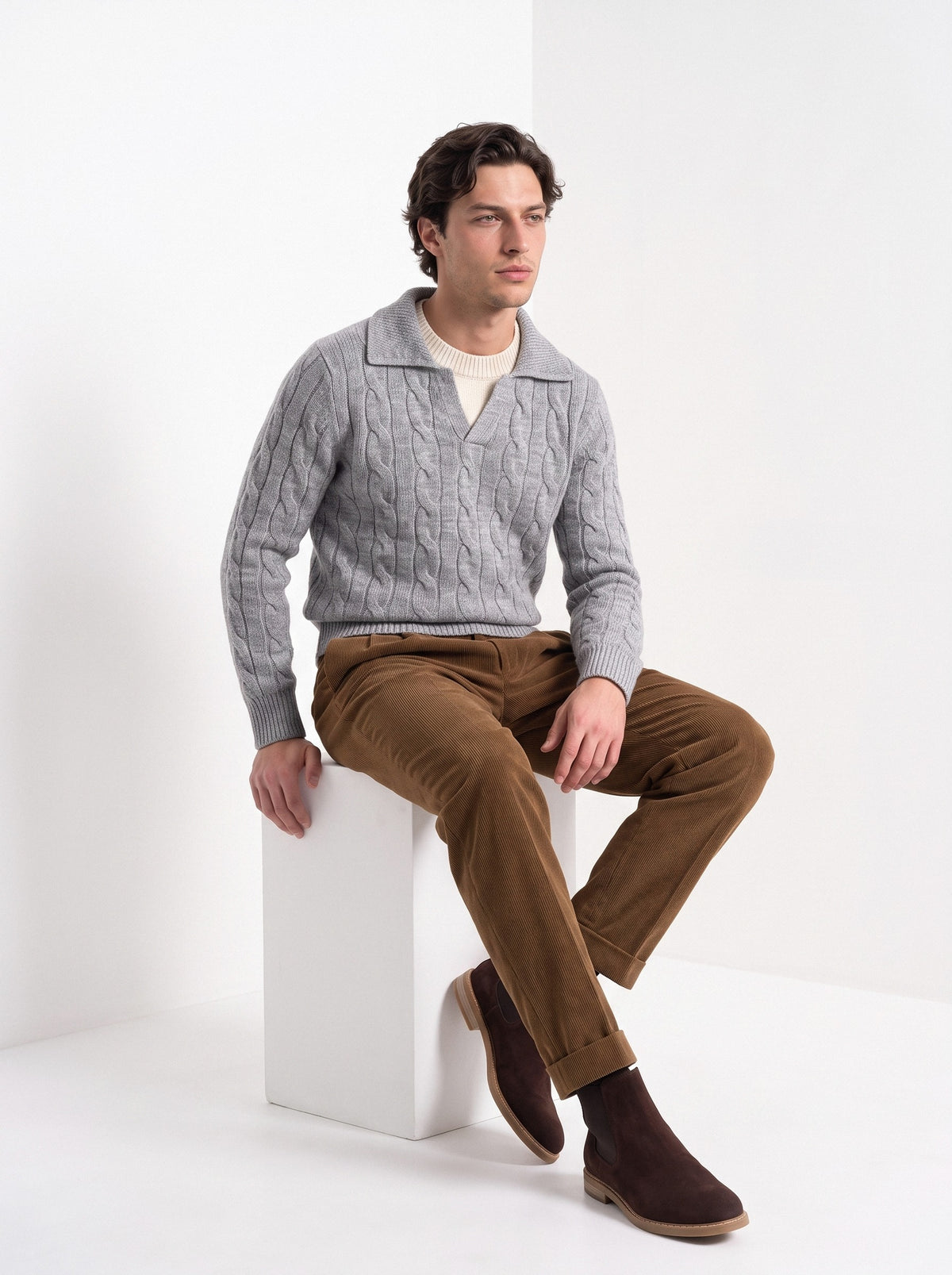 BLENIN men's layered collar cable sweater in light grey, seated, full outfit