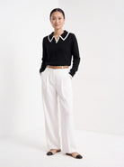 BLENIN piped collar sweater in black, full-length front view