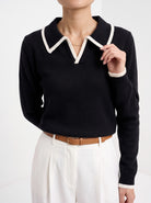 BLENIN piped collar sweater in black, close-up of the details