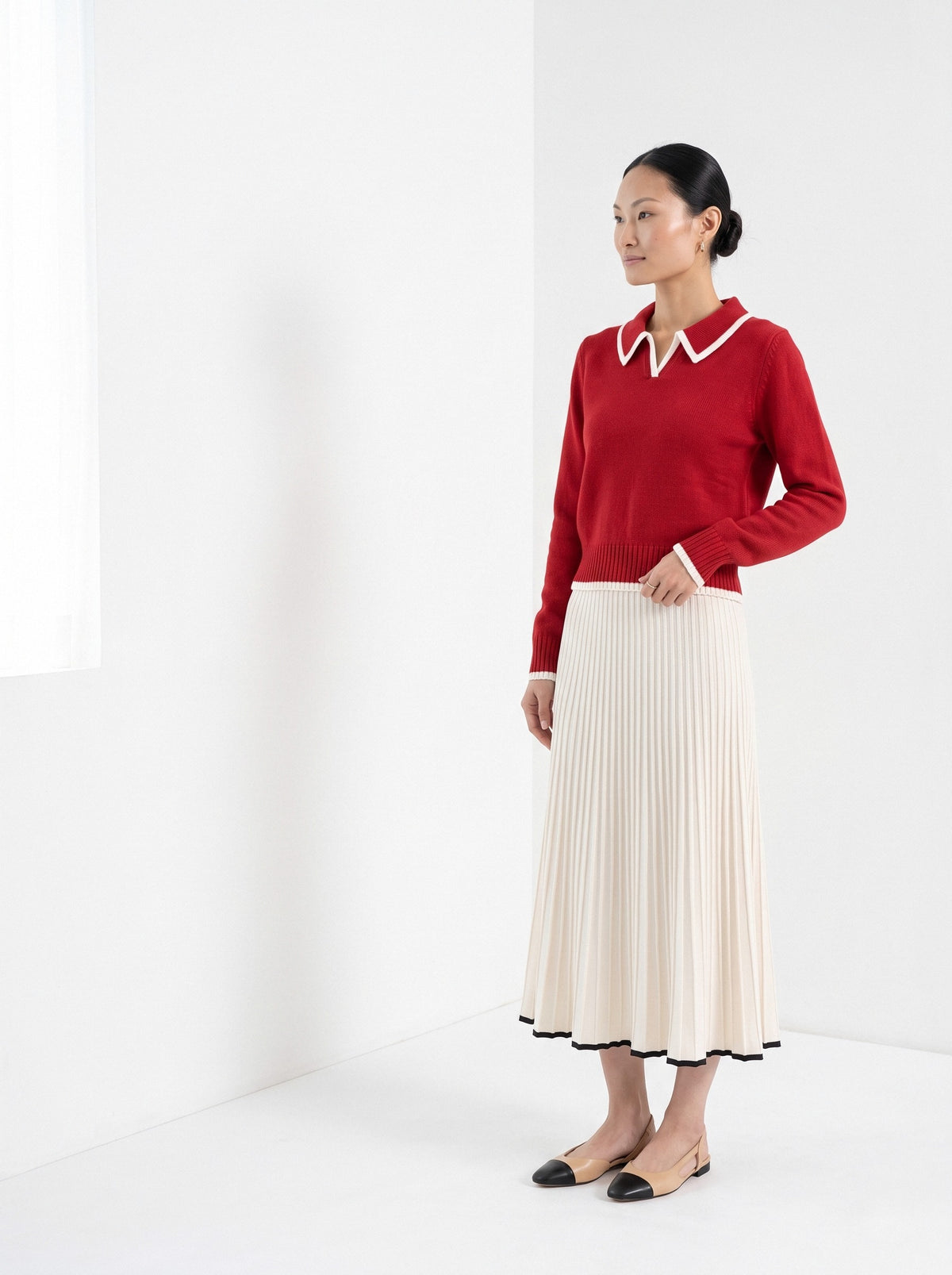 BLENIN piped collar sweater in red, three-quarter view