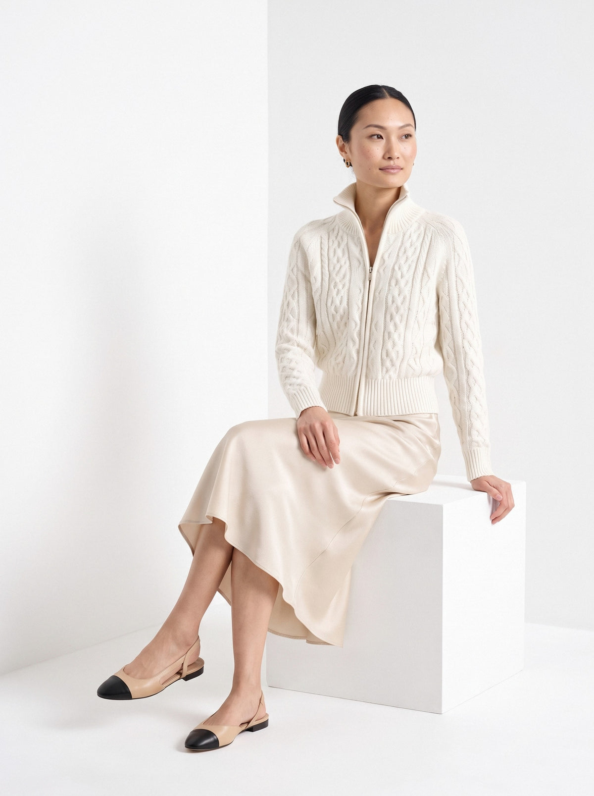 BLENIN cable knit zip cardigan in ivory, seated, full outfit