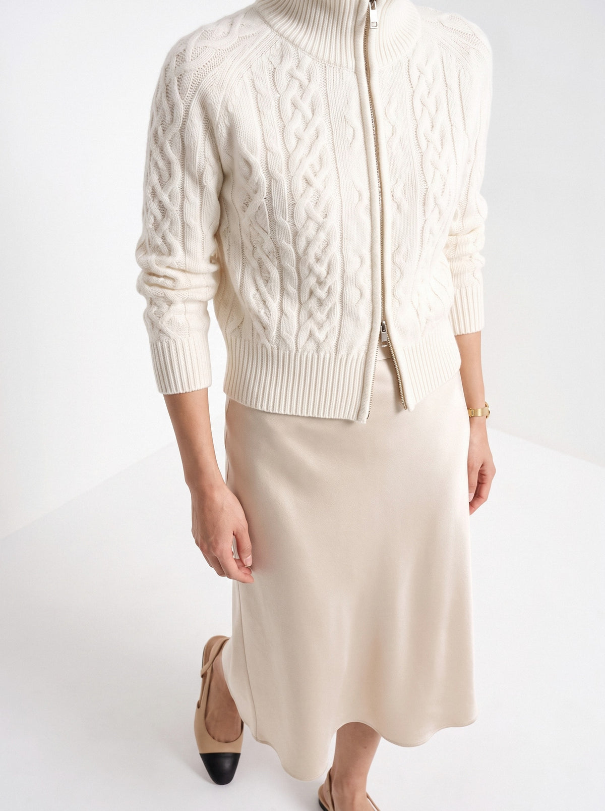 BLENIN cable knit zip cardigan in ivory, fit detail at the hem and cuff