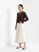 BLENIN contrast trim knit polo in chocolate, three-quarter view