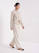BLENIN mandarin collar cardigan in oatmeal, full outfit, walking