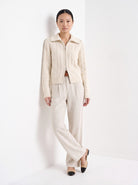 BLENIN cable zip collar cardigan in cream, full-length front view