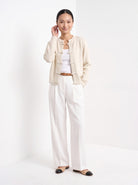 BLENIN knot button cardigan in cream, full-length front view