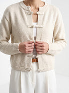 BLENIN knot button cardigan in cream, close-up of the collar and details