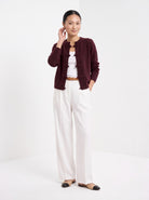BLENIN knot button cardigan in burgundy, full-length front view