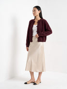 BLENIN knot button cardigan in burgundy, three-quarter view