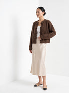 BLENIN knot button cardigan in chocolate, three-quarter view